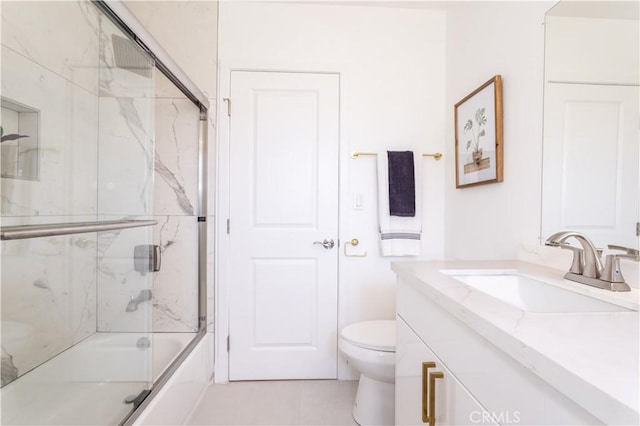 11652 Mclennan Ave, Granada Hills, CA 91344 - full bathroom with vanity, bath / shower combo with glass door, tile patterned floors, and toilet