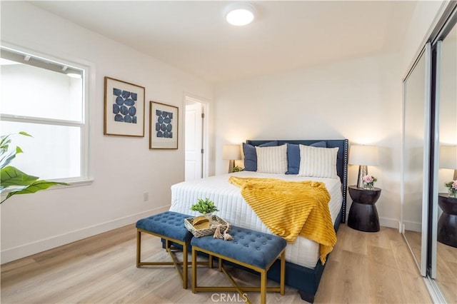 11652 Mclennan Ave, Granada Hills, CA 91344 - bedroom featuring a closet, baseboards, and light wood-style floors