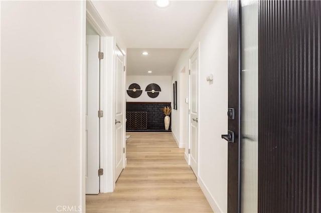 11652 Mclennan Ave, Granada Hills, CA 91344 - corridor featuring recessed lighting, light wood-style flooring, and baseboards