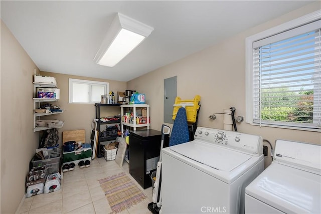 28970 Exmoor Ct, Menifee, CA 92586 - laundry room with washer and dryer, electric panel, and light tile patterned floors