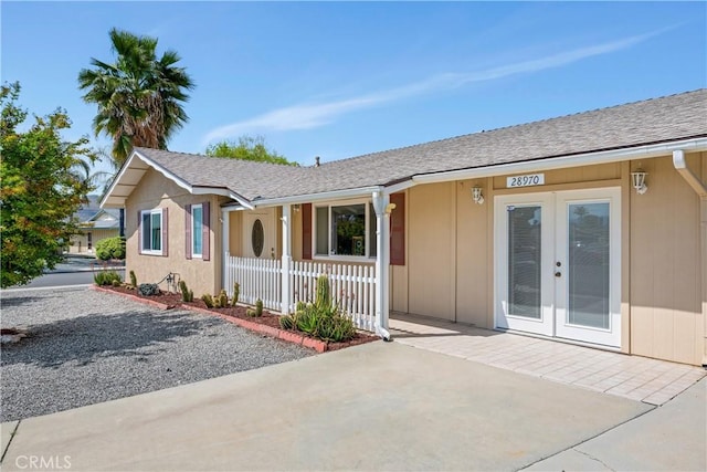 28970 Exmoor Ct, Menifee, CA 92586 - single story home with a porch, french doors, and roof with shingles
