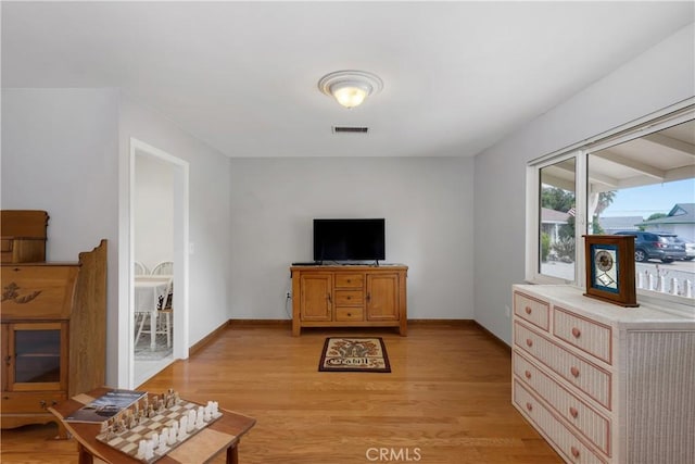 28970 Exmoor Ct, Menifee, CA 92586 - interior space featuring baseboards, visible vents, and light wood-style flooring