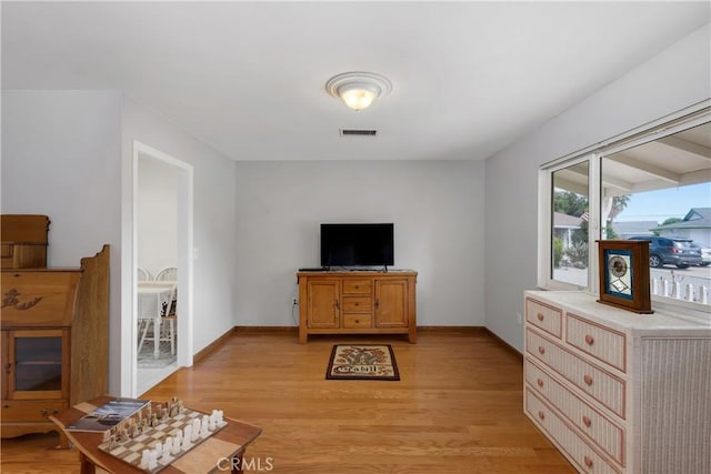 28970 Exmoor Ct, Menifee, CA 92586 - living area with light wood finished floors and baseboards