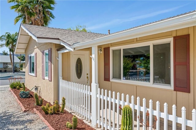 28970 Exmoor Ct, Menifee, CA 92586 - view of exterior entry with roof with shingles