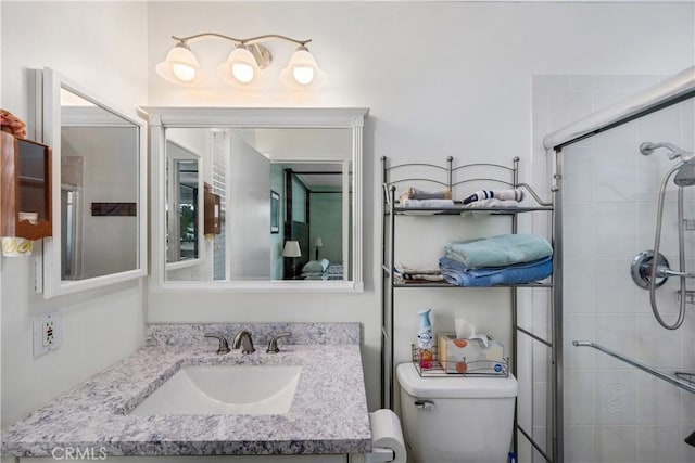 28970 Exmoor Ct, Menifee, CA 92586 - bathroom featuring vanity, a tile shower, and toilet