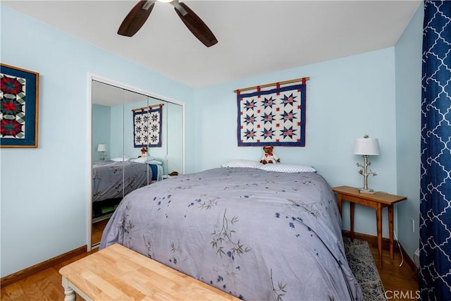 28970 Exmoor Ct, Menifee, CA 92586 - bedroom featuring baseboards, ceiling fan, a closet, and wood finished floors