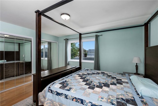 28970 Exmoor Ct, Menifee, CA 92586 - bedroom with wood finished floors and two closets