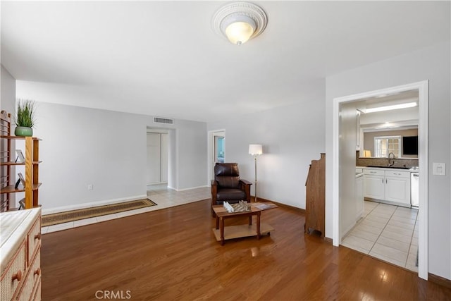 28970 Exmoor Ct, Menifee, CA 92586 - living area with light wood-type flooring and baseboards