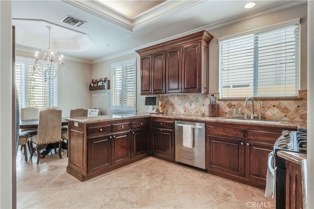 kitchen featuring a notable chandelier, a sink, stove, decorative backsplash, and stainless steel dishwasher