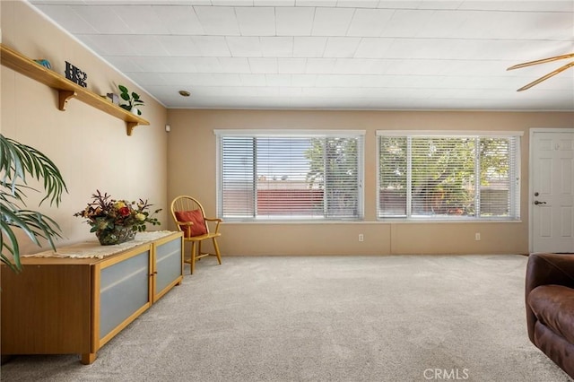 2574 W Heffron Dr, Anaheim, CA 92804 - sitting room featuring plenty of natural light, ceiling fan, and light carpet