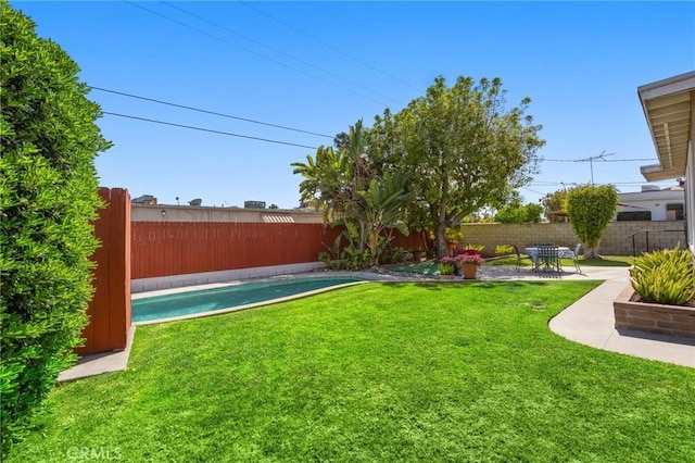 2574 W Heffron Dr, Anaheim, CA 92804 - view of yard with a fenced backyard and a patio area