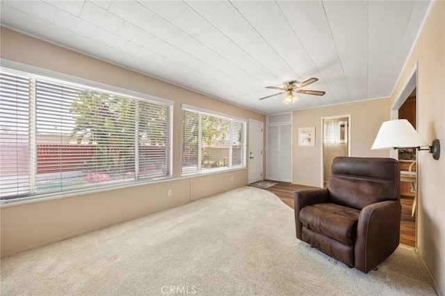 2574 W Heffron Dr, Anaheim, CA 92804 - sitting room with ceiling fan and carpet flooring