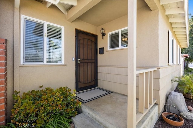 2574 W Heffron Dr, Anaheim, CA 92804 - doorway to property featuring stucco siding