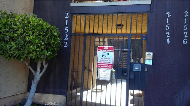 21522 Belshire Ave Unit 10, Hawaiian Gardens, CA 90716 - exterior details with a gate
