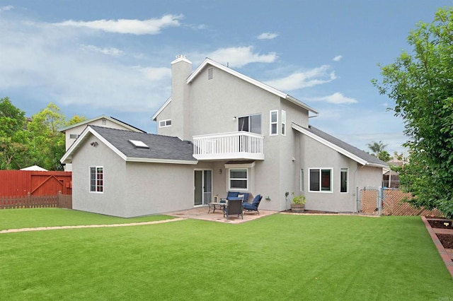 1684 Charlie Horse Way, Oceanside, CA 92057 - rear view of property with a fenced backyard, a balcony, a patio area, a gate, and stucco siding