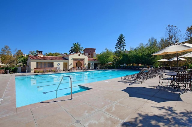 pool with a patio