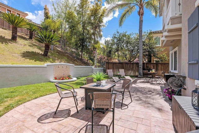 2258 Aventurine Pl, Carlsbad, CA 92009 - fenced backyard featuring outdoor dining area and a patio