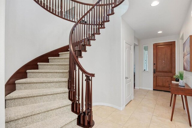 2258 Aventurine Pl, Carlsbad, CA 92009 - tiled foyer entrance with stairs, baseboards, and recessed lighting