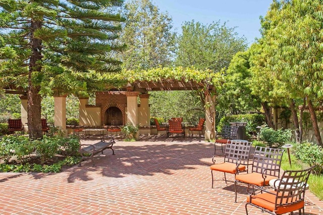 2258 Aventurine Pl, Carlsbad, CA 92009 - view of patio / terrace with an outdoor brick fireplace