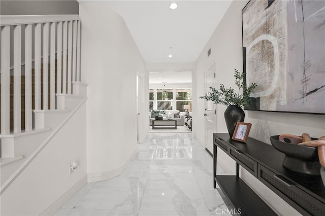 hallway with marble finish floor, stairs, recessed lighting, baseboards, and visible vents