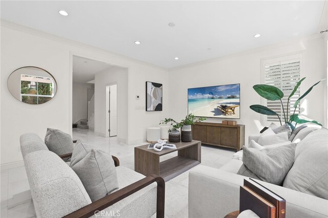 living room with baseboards, recessed lighting, and marble finish floor