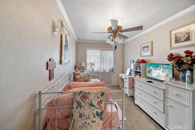 bedroom with crown molding, ceiling fan, light colored carpet, and a textured wall