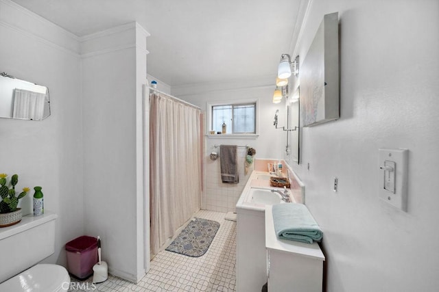 full bathroom with tile patterned floors, ornamental molding, toilet, and a shower with shower curtain