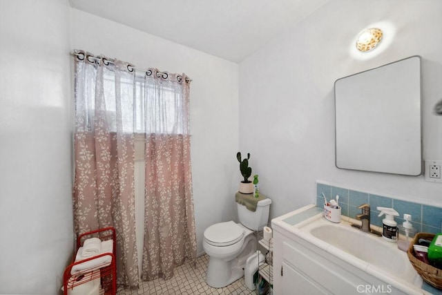 full bath with vanity, tile patterned floors, and toilet