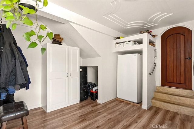 26231 Wilson St, Los Molinos, CA 96055 - laundry area with baseboards and light wood-style floors