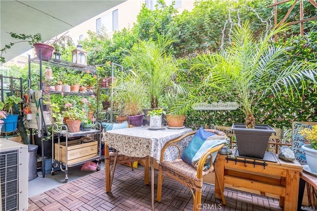 view of patio featuring outdoor dining space
