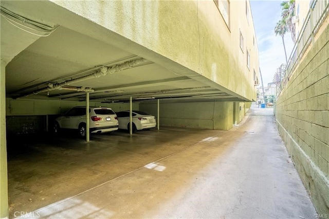 view of vehicle parking featuring a parking deck