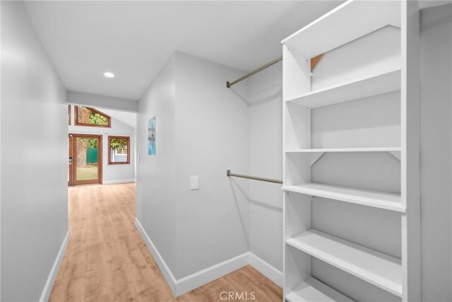 spacious closet featuring wood finished floors