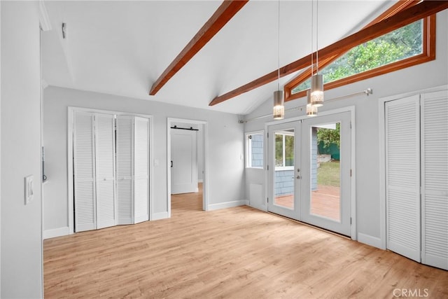 interior space with access to outside, lofted ceiling with beams, french doors, light wood-style flooring, and baseboards