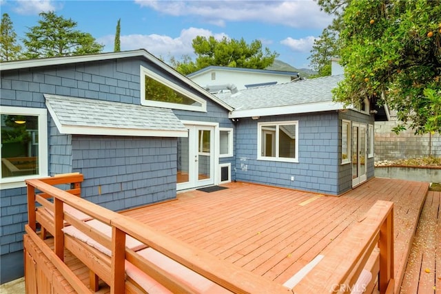 wooden deck featuring french doors