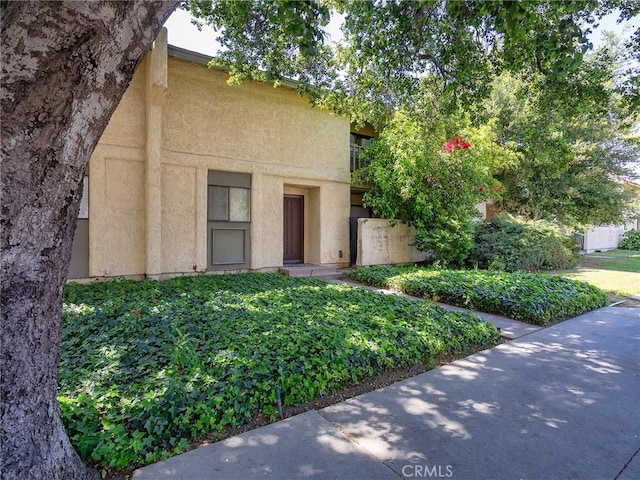 exterior space featuring stucco siding