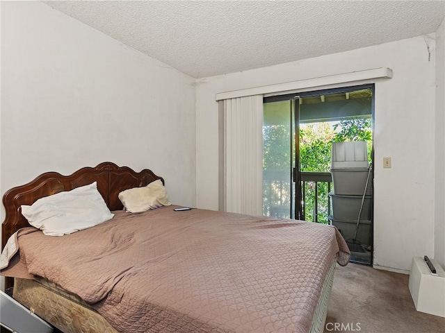 carpeted bedroom with a textured ceiling