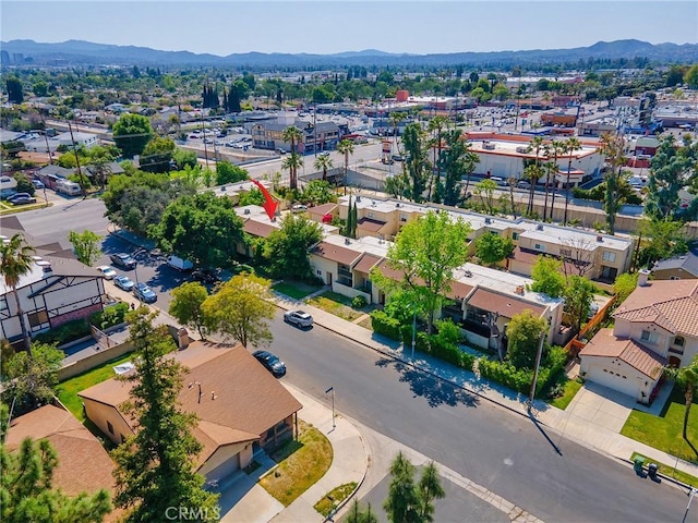 drone / aerial view featuring a mountain view