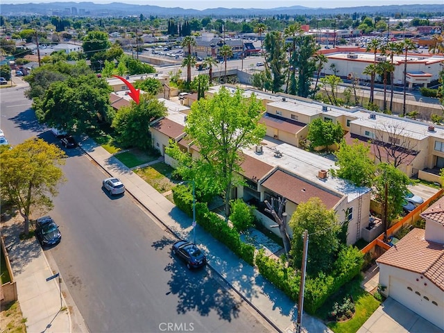 birds eye view of property featuring a residential view and a mountain view