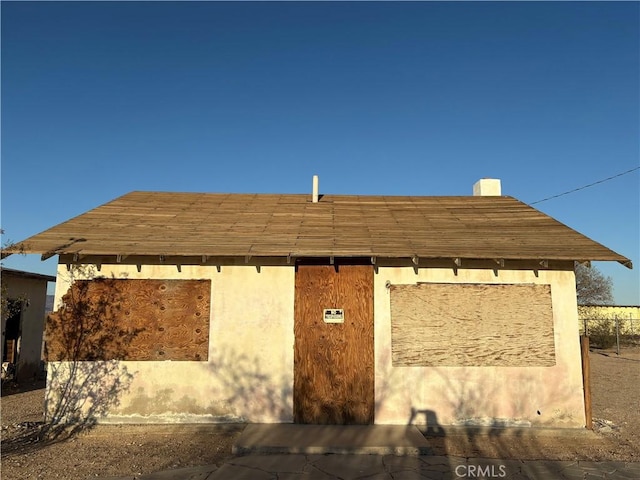 view of front facade with stucco siding