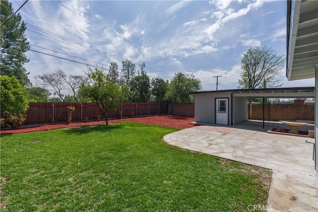 view of yard with a patio and a fenced backyard