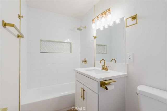 bathroom featuring toilet, bathing tub / shower combination, and vanity