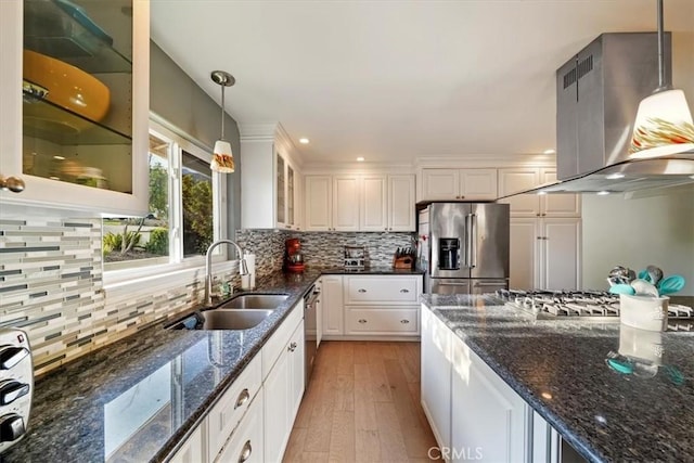 9179 Hidden Farm Rd, Rancho Cucamonga, CA 91737 - kitchen with appliances with stainless steel finishes, a sink, extractor fan, light wood-type flooring, and tasteful backsplash