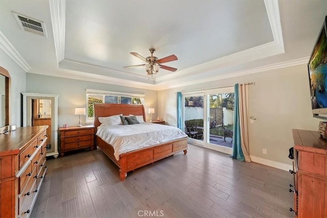 9179 Hidden Farm Rd, Rancho Cucamonga, CA 91737 - bedroom with visible vents, access to outside, a tray ceiling, and multiple windows