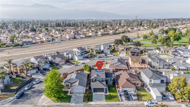 aerial view with a residential view and a mountain view