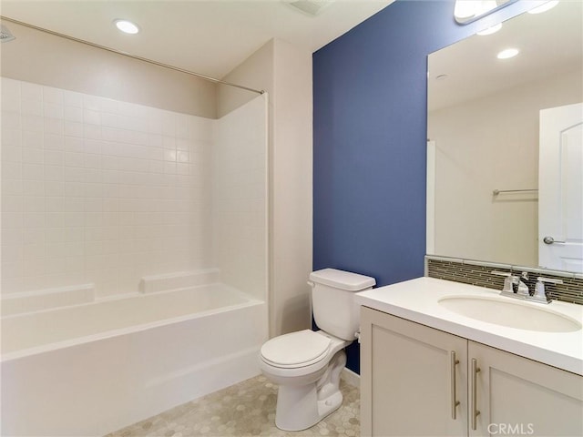 full bathroom featuring vanity, recessed lighting, shower / bathtub combination, and toilet