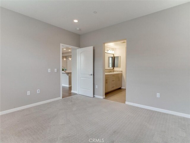 418 Maravilla Ln, Brea, CA 92823 - unfurnished bedroom featuring light colored carpet, baseboards, recessed lighting, and ensuite bath