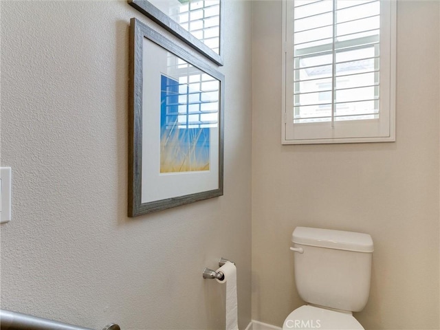 half bathroom with toilet