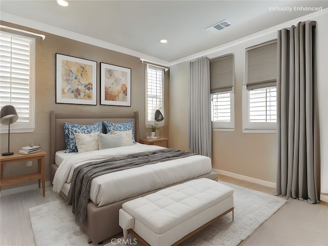 bedroom with baseboards, recessed lighting, and visible vents