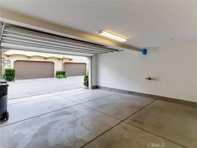 418 Maravilla Ln, Brea, CA 92823 - garage with baseboards