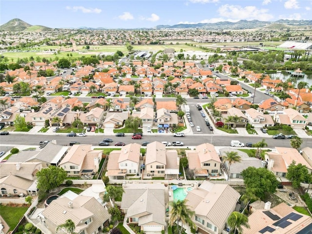 birds eye view of property featuring a mountain view and a residential view